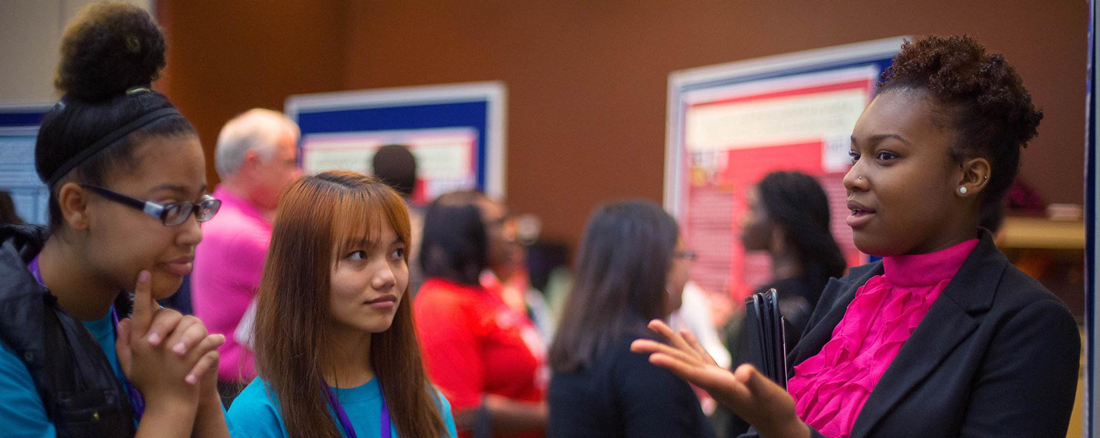 Student explaining their Psychology research